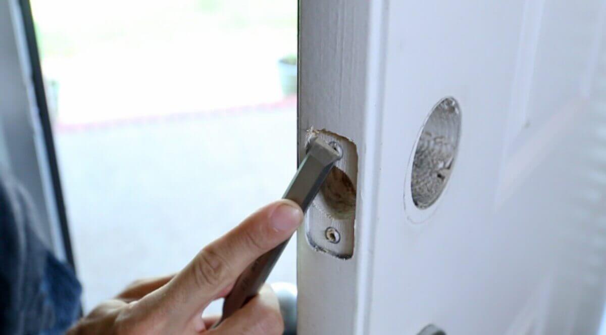 Remove the old lock and door handle